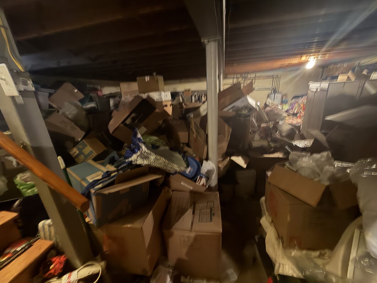Packed basement full of boxes before cleanout