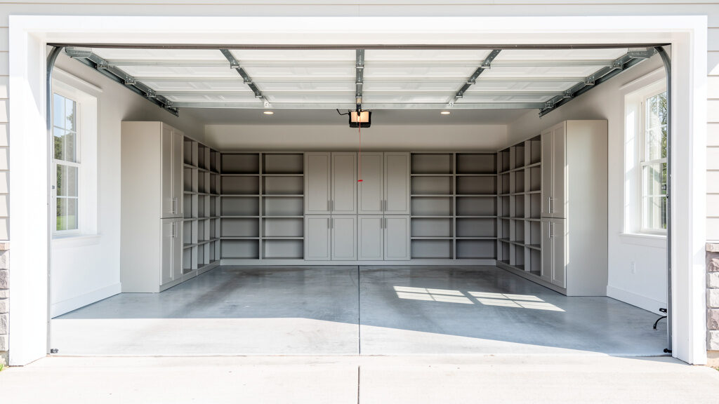 Professional crew organizing and loading garage items